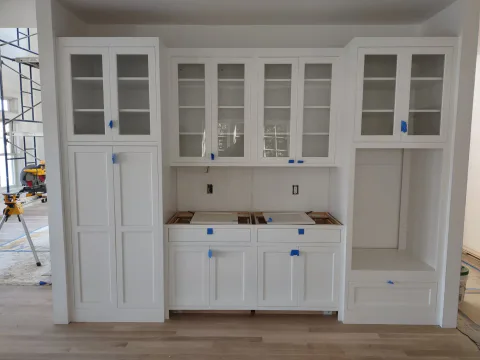 Custom built-in cabinetry with a glass-front display hutch, Upper Valley NH